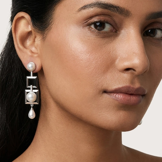 Align freshwater pearl earrings side view
