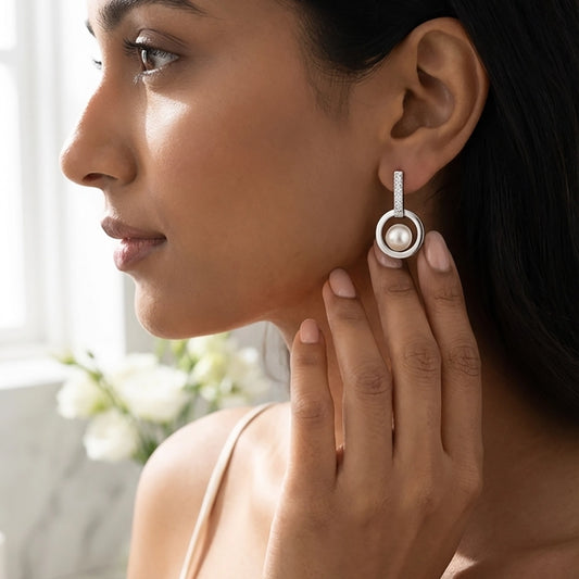 Orion Loop pearl earrings elegant side view