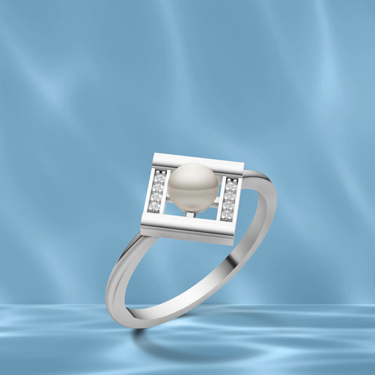 Silver Pearl Square Ring with Diamond Detailing displayed against a Wavy Light Blue Silk Background
