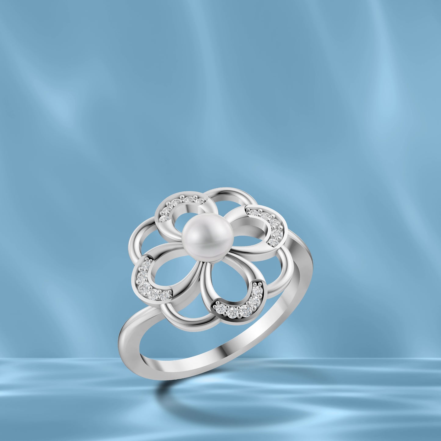 Silver Pearl Flower Ring displayed against a Wavy Light Blue Silk Background.