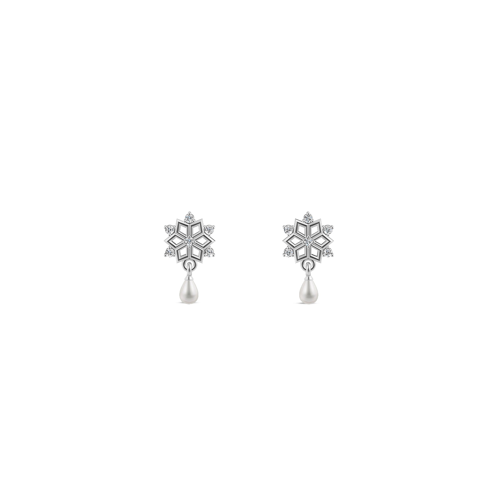 Silver snowflake jewelry set glowing against a dark blue underwater background with sunbeams