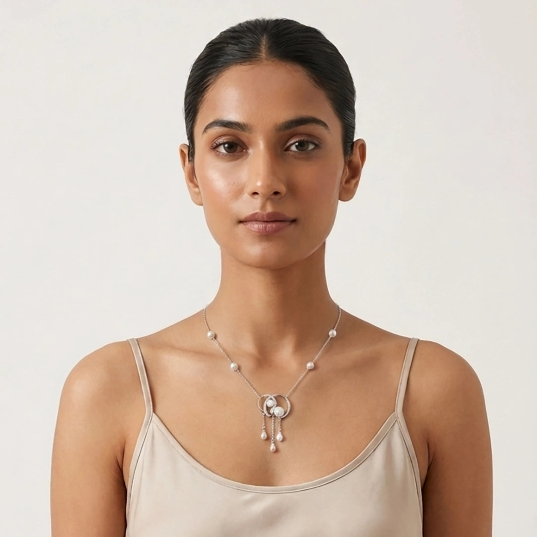 Nora silver gold plated necklace set on display