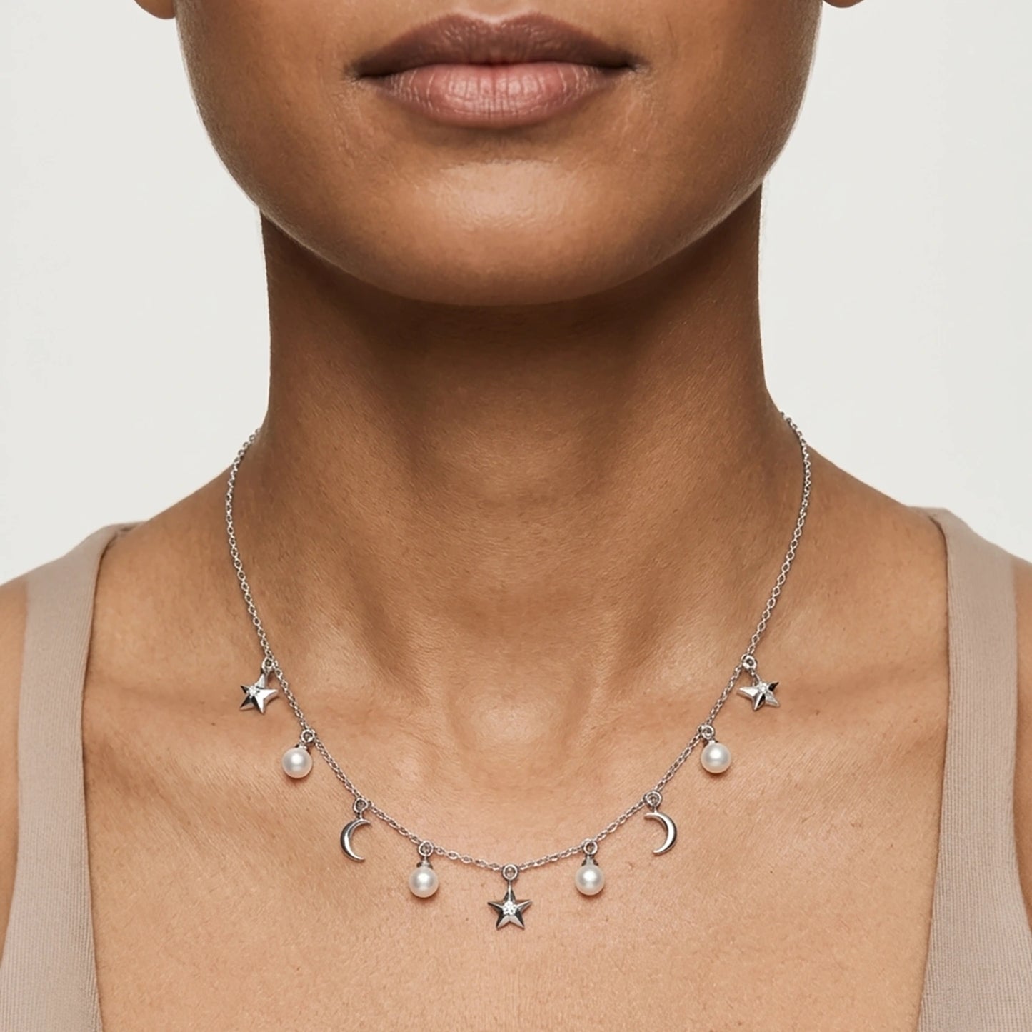 Celestine Charm pearl necklace elegant silver detailing