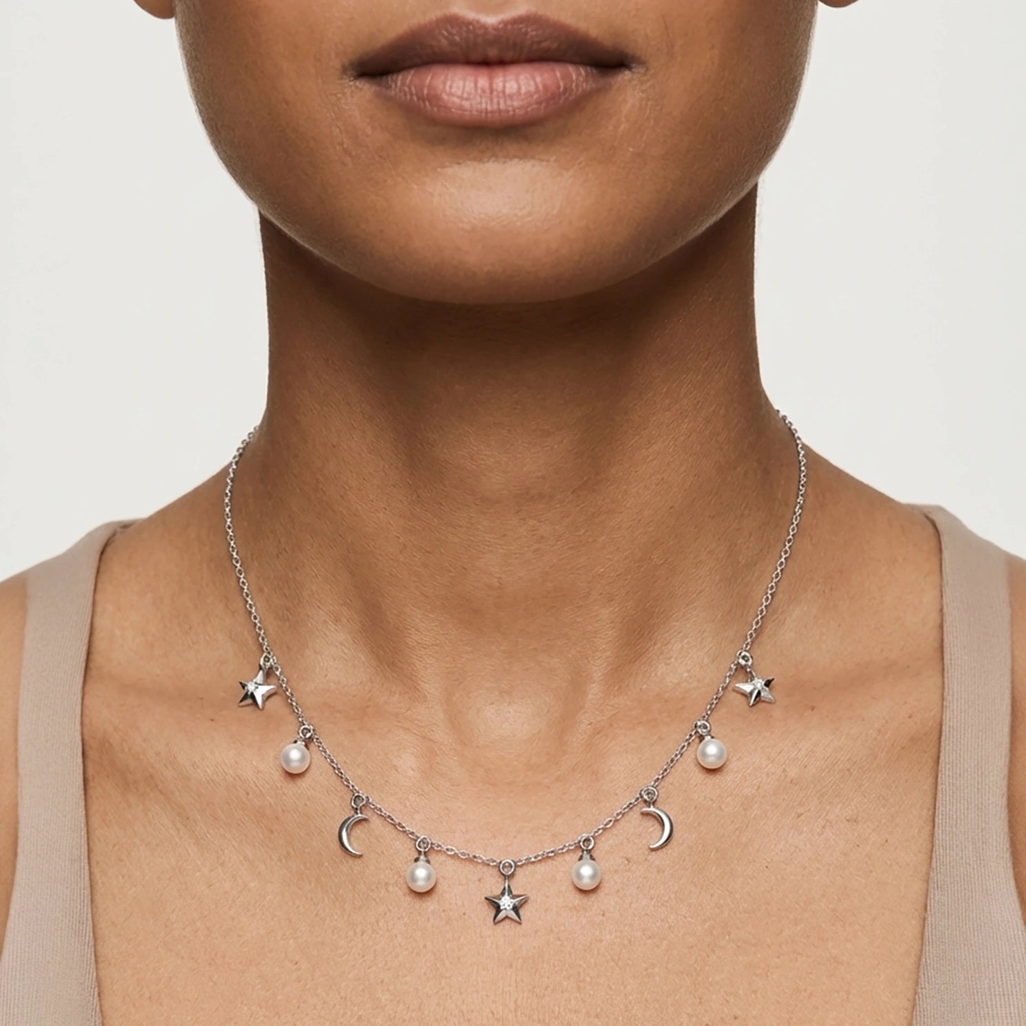 Celestine Charm pearl necklace elegant silver detailing