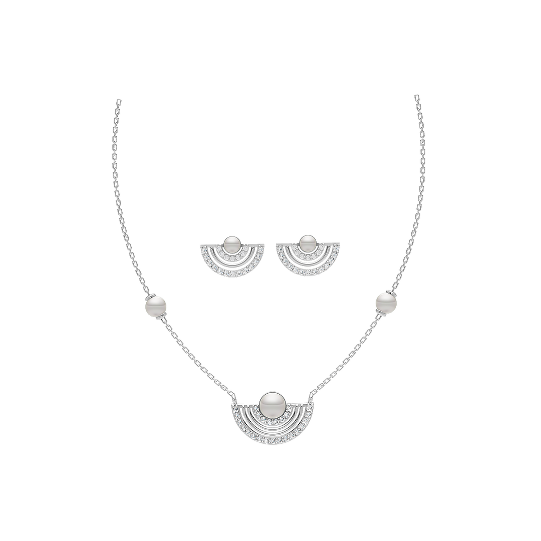 A set of jewelry, including a necklace and earrings, with silver metal and clear stones.