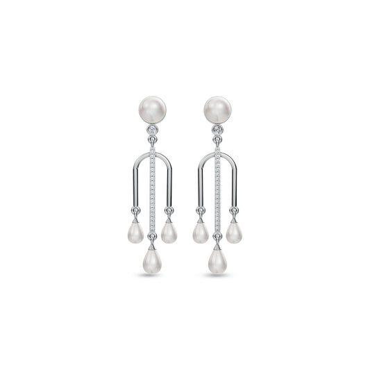Charm pearl silver earrings close-up image