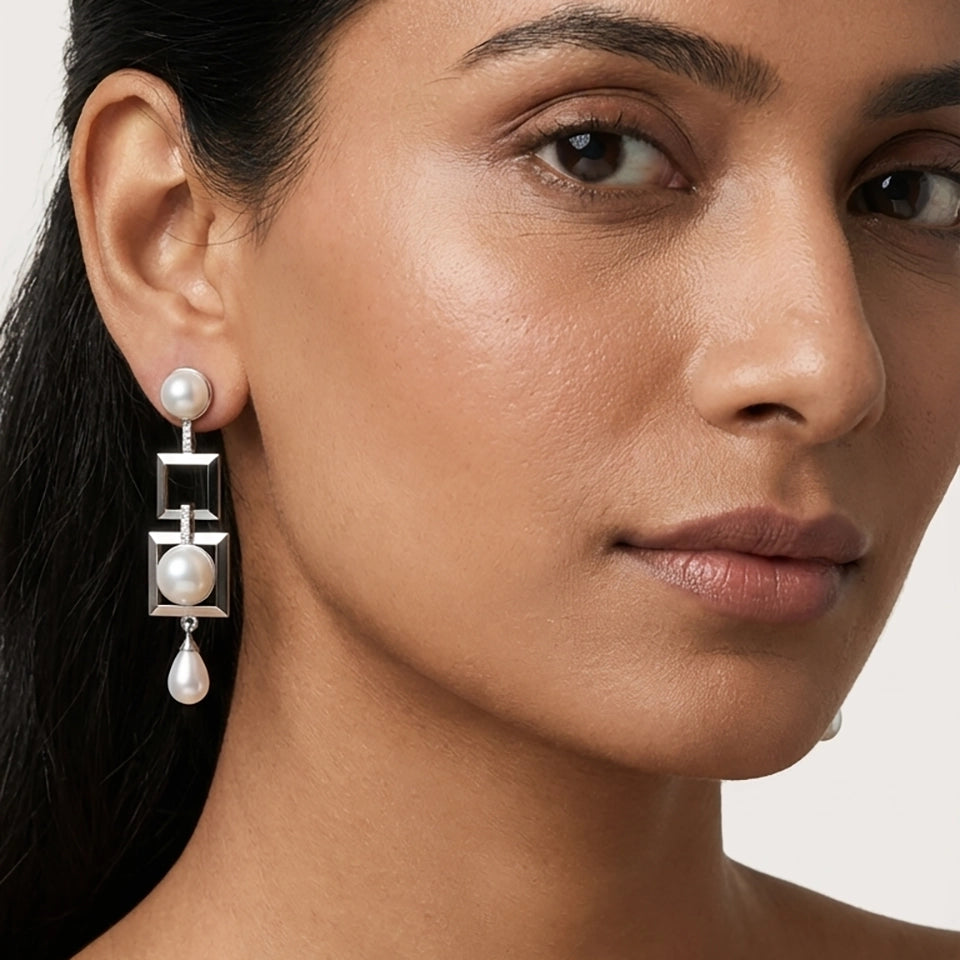 Align freshwater pearl earrings side view