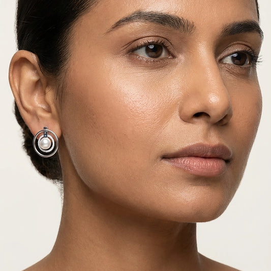 A Model Wearing Pearl Stud Earrings In A Modern Silver Pearl Jewellery Set Design For An Elegant Look.