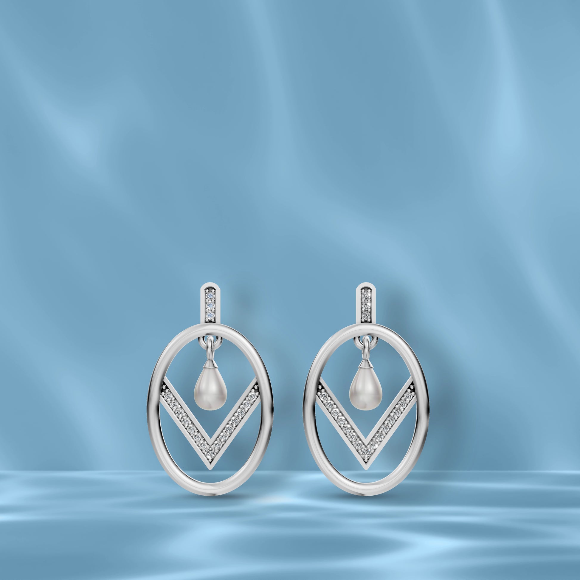 Premium Freshwater Pearl Earrings Displayed On A Blue Silk Backdrop Showcasing Original Pearl Earrings.