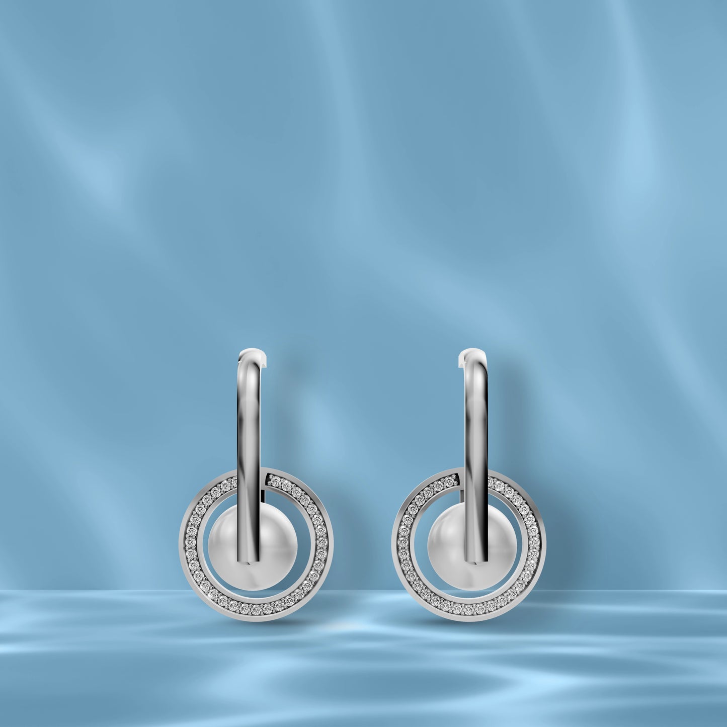 High-Quality Freshwater Pearl Earrings Displayed Against A Blue Silk Backdrop Highlighting Original Pearl Earrings.