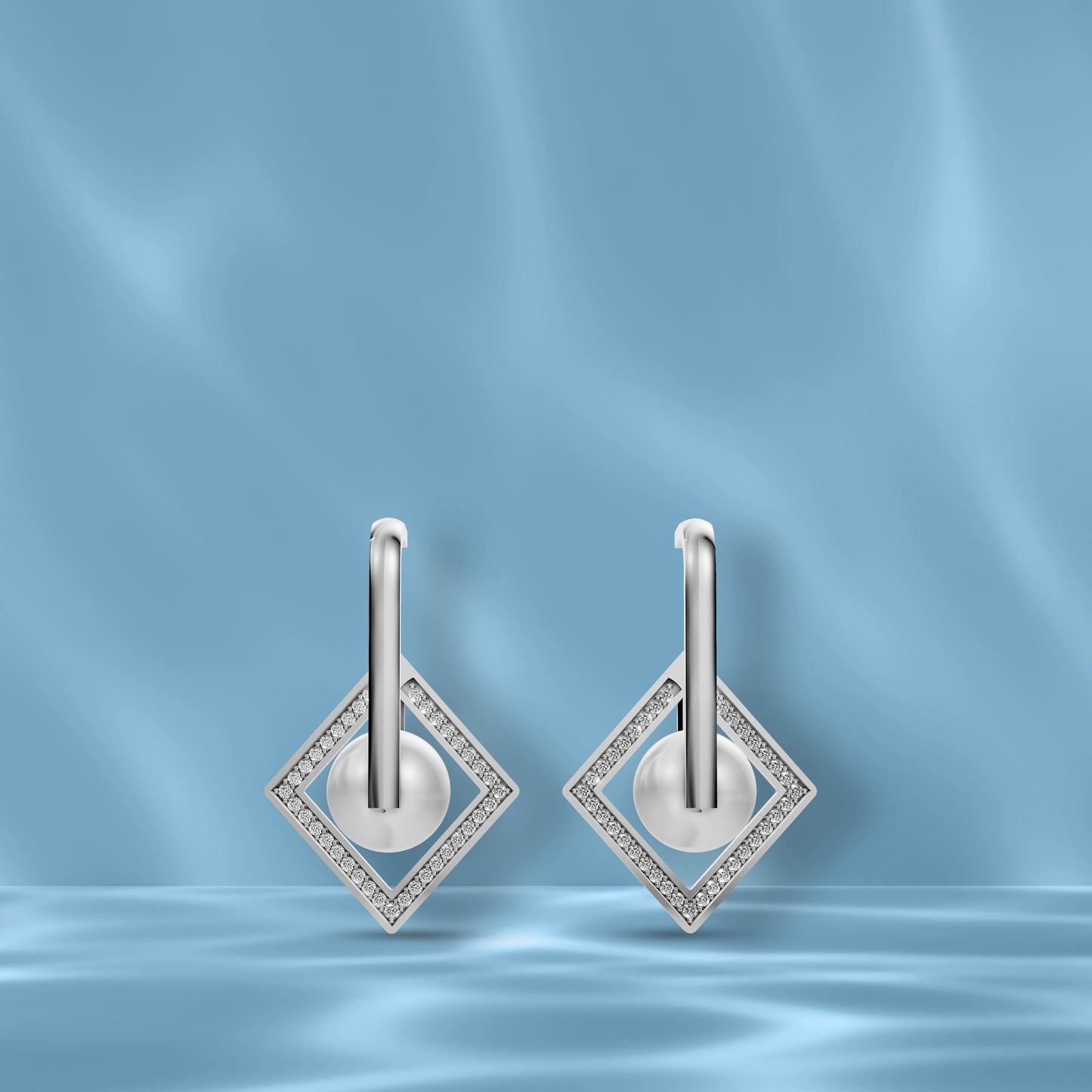 Premium Freshwater Pearl Earrings Showcased On A Blue Silk Background Highlighting Original Pearl Earrings Quality.