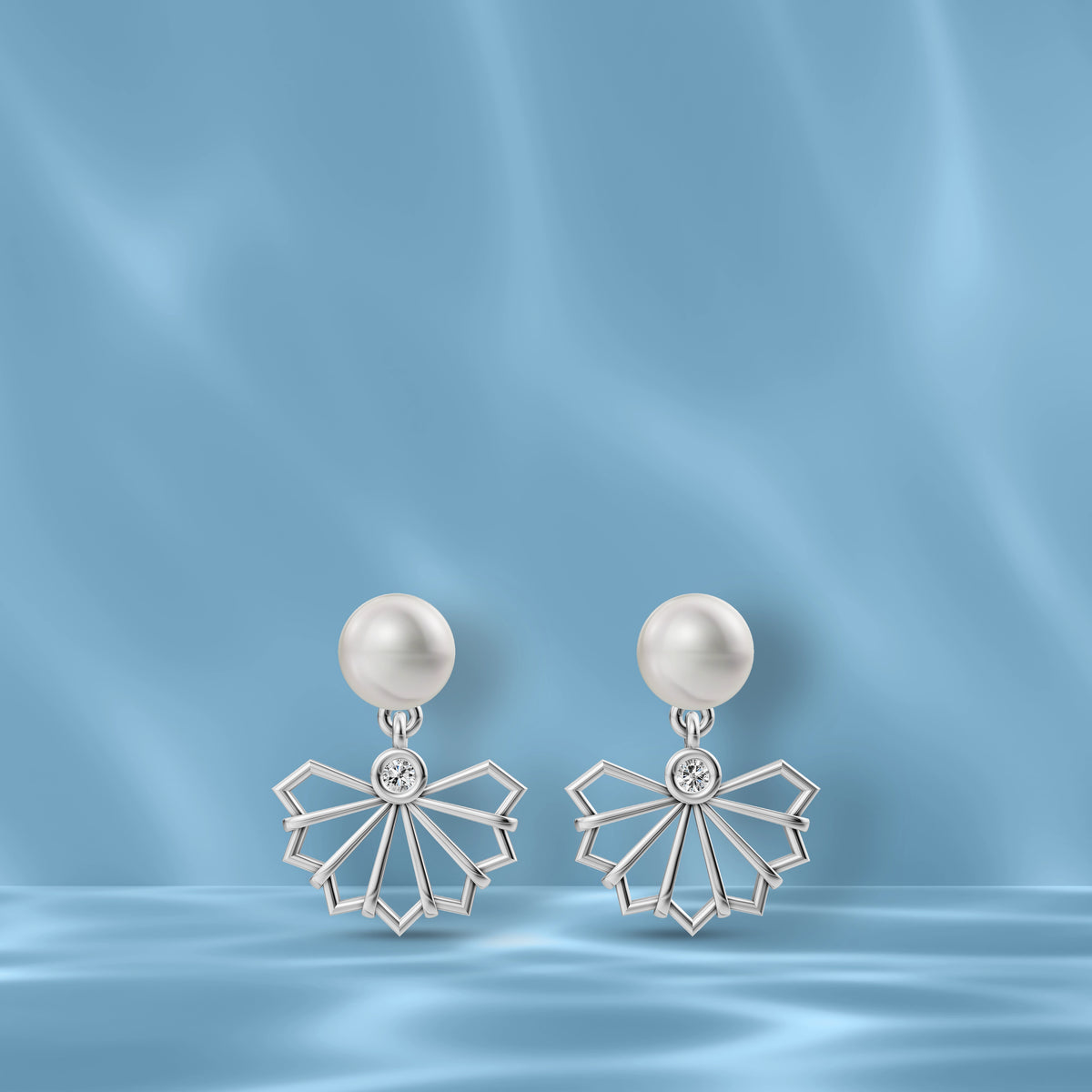 Elegant Freshwater Pearl Earrings Displayed On A Silk Background Highlighting Original Pearl Earrings Quality.