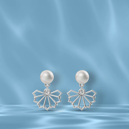 Elegant Freshwater Pearl Earrings Displayed On A Silk Background Highlighting Original Pearl Earrings Quality.