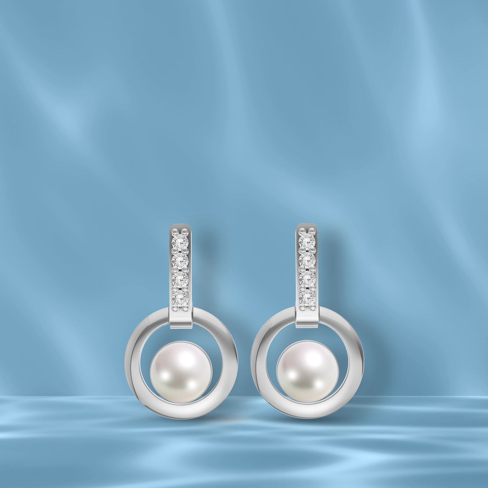 Orion Loop pearl earrings modern silver elegance