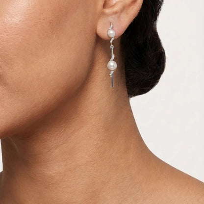 Silver pearl earrings by Sohvii