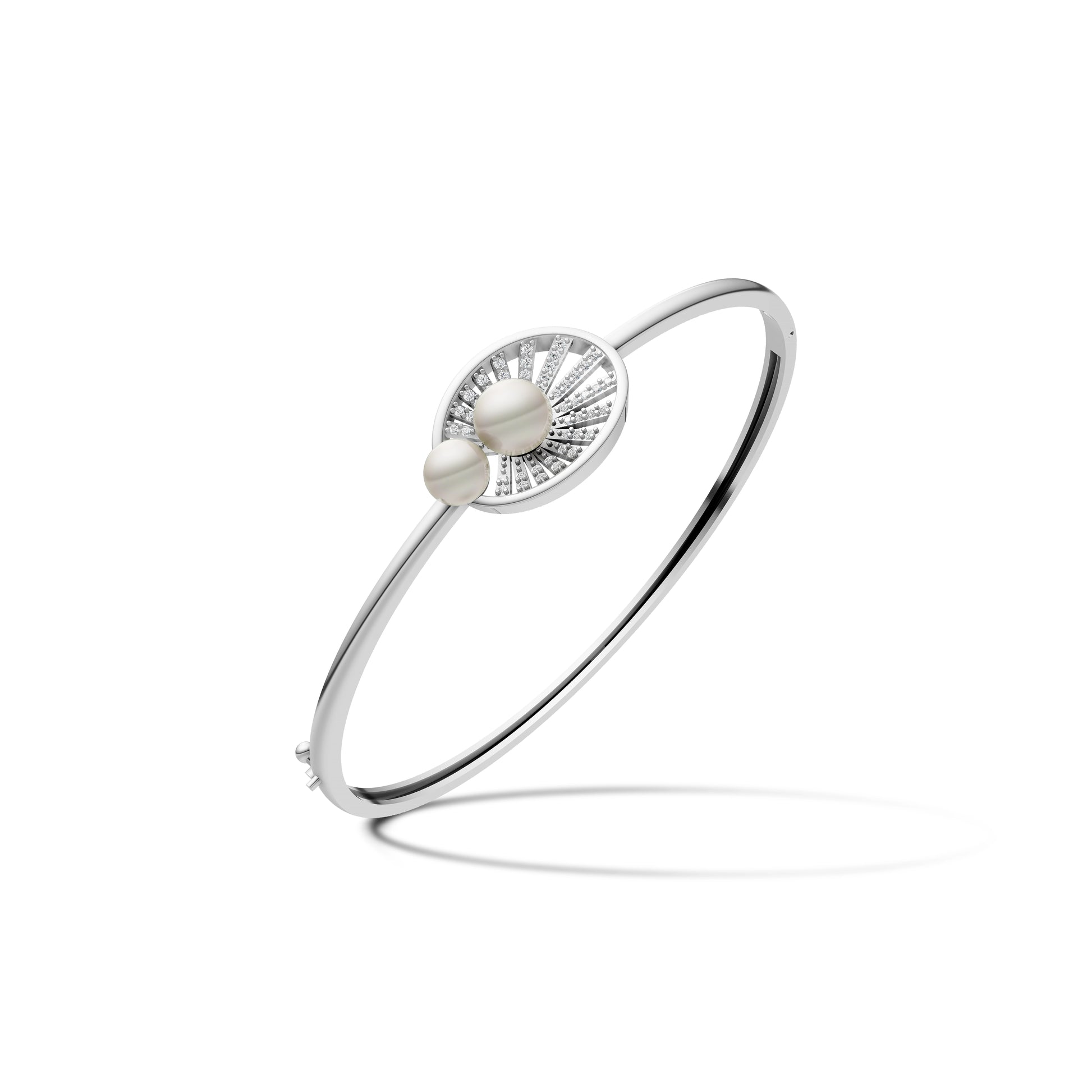 Sleek silver kada featuring a sunburst shell motif set with two white pearls on a white background.