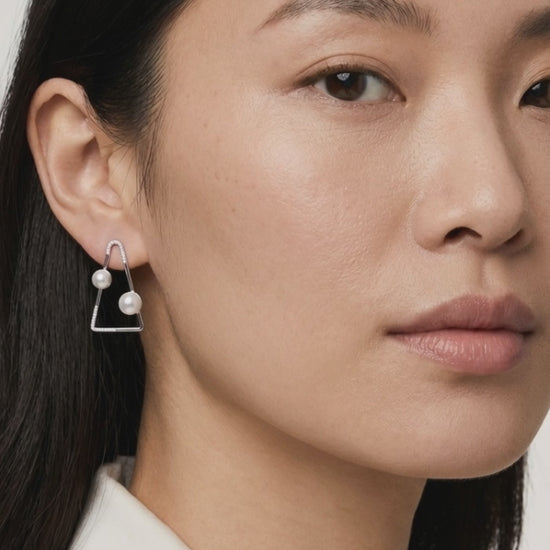 Prism pearl earrings premium jewelry close-up