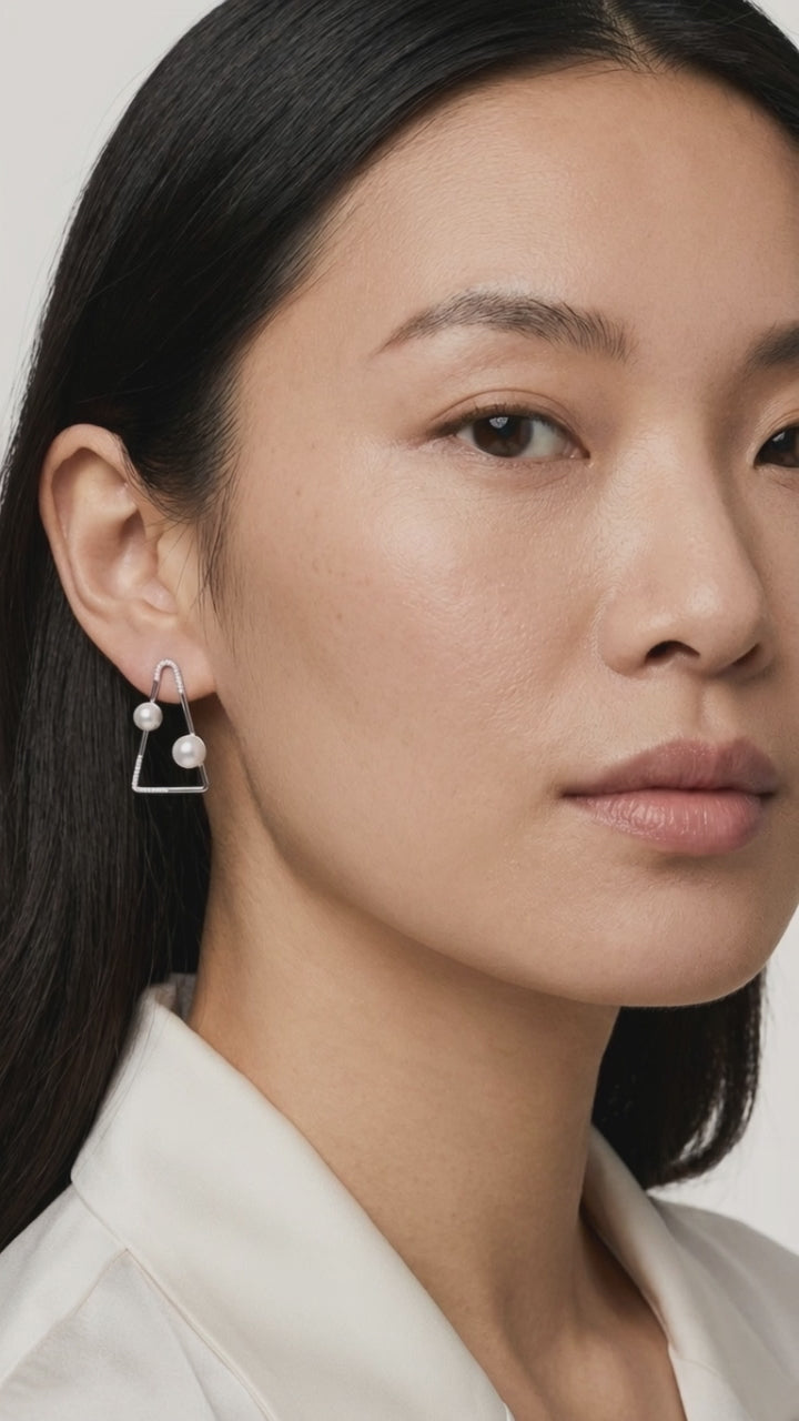 Prism pearl earrings premium jewelry close-up